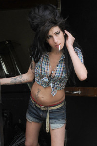 Amy Winehouse poses for the camera on the doorstep of her London home.<P><B>Ref: SPL28844 280408 </B